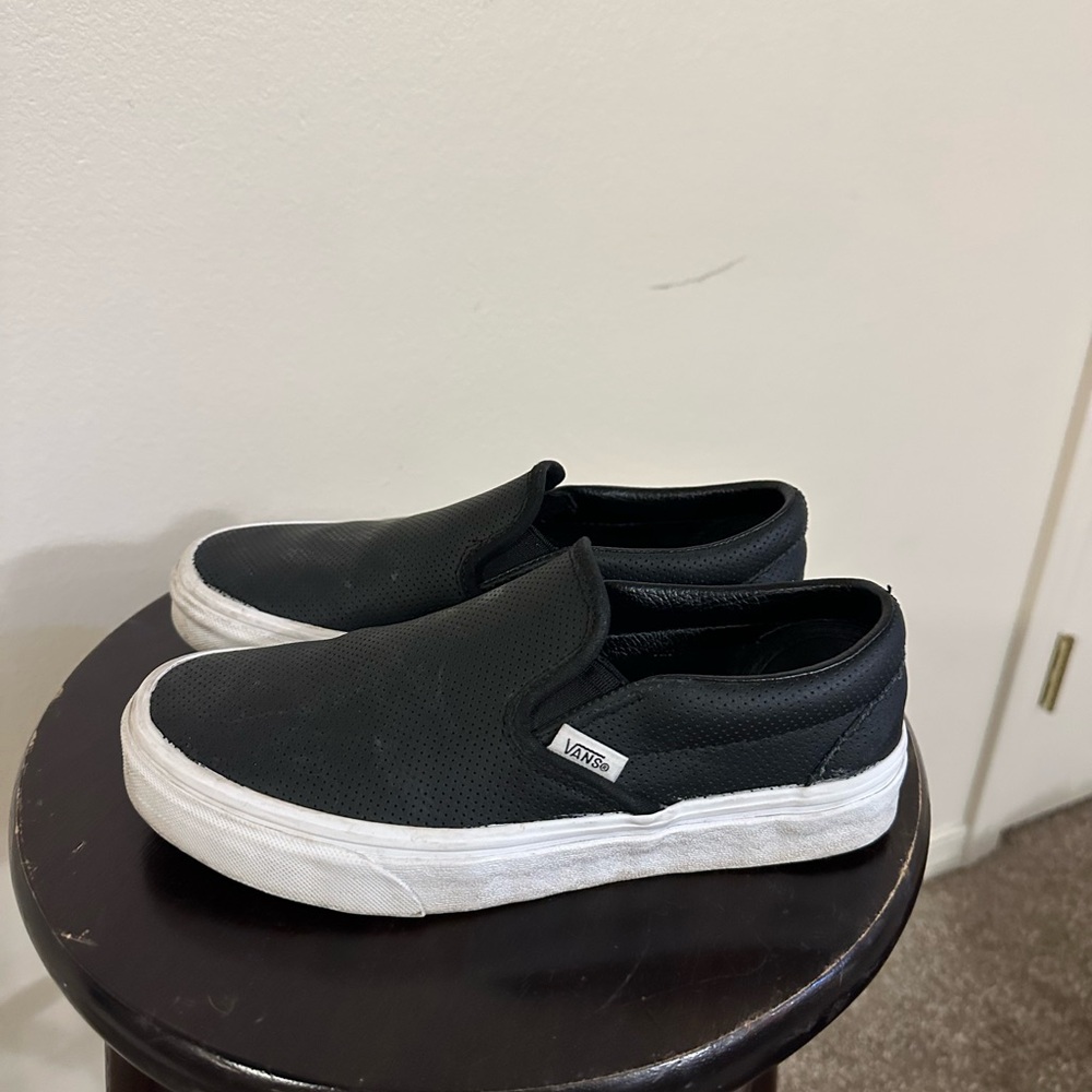 Black perforated vans